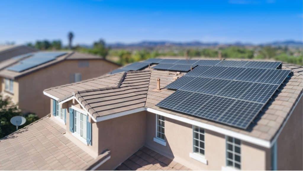 Solar panels installed on a residential home creating potential financing and resale risks for military homeowners